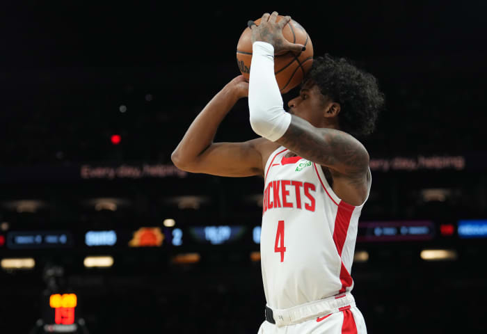 Rockets guard Jalen Green (4) shoots against the Phoenix Suns during the first half at Footprint Center.